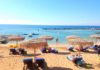 Зонтики для клиентов отеля, пляж Лимнара Кермия, Ай Напа, Кипр