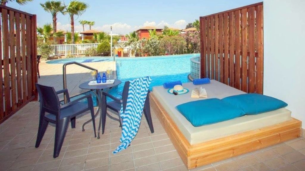 Терраса семейного номера, примыкающая к бассейну, Atlantica Aeneas Resort Spa, Айя Напа, Кипр